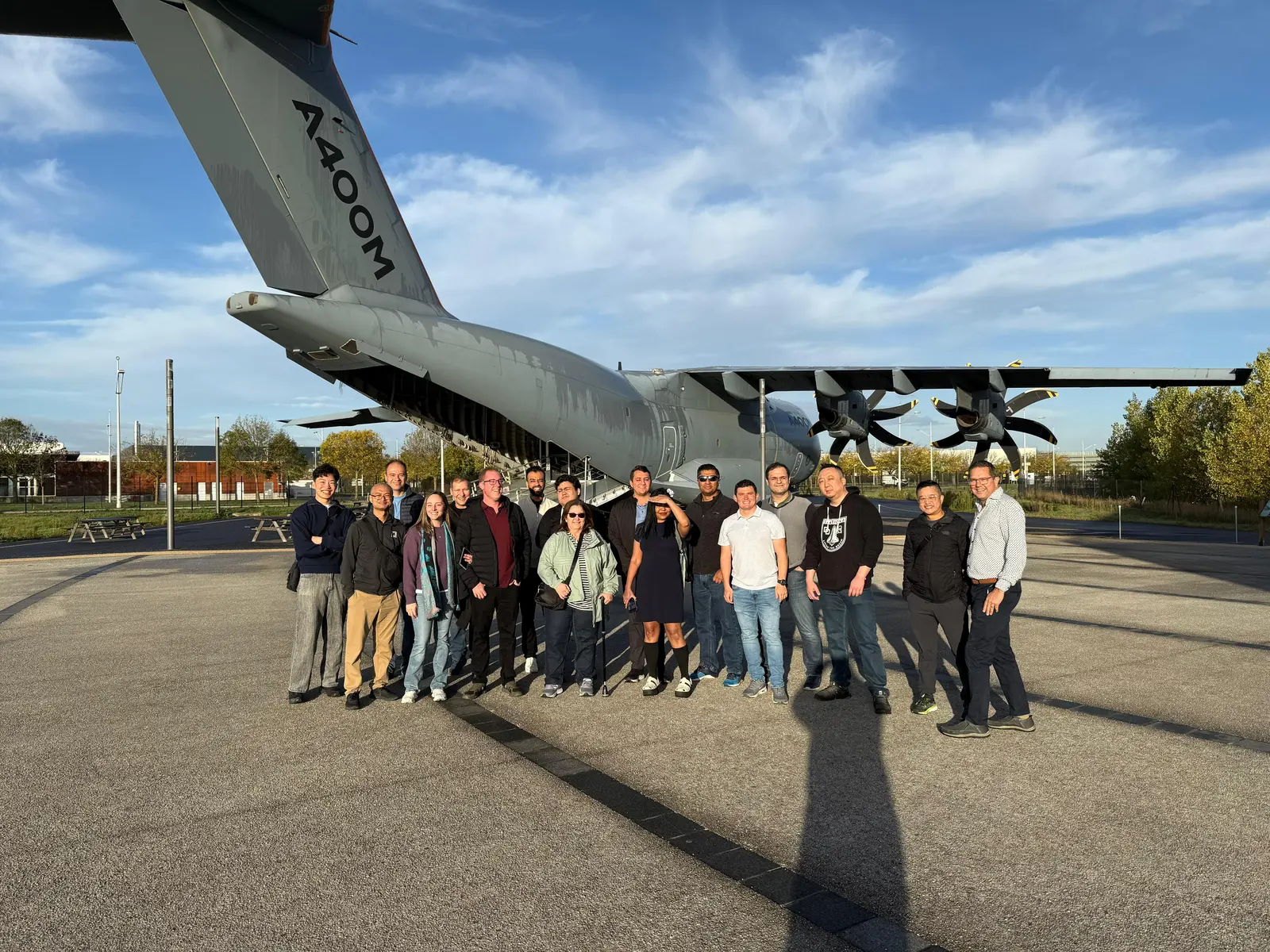 Sarah and her visit group standing in front of an Airbus A400M military transport aircraft