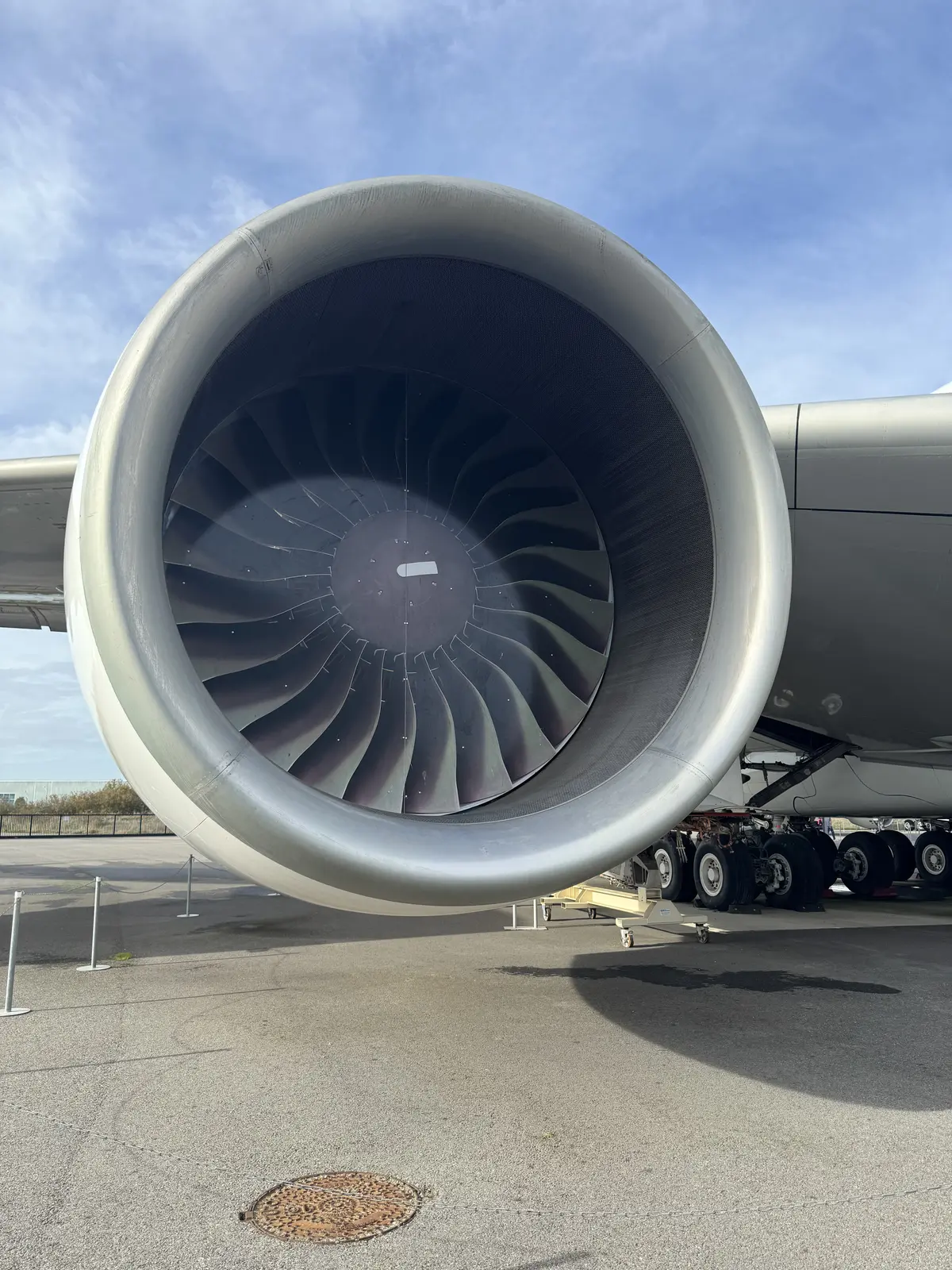 Close view into the large turbofan engine of an Airbus aircraft